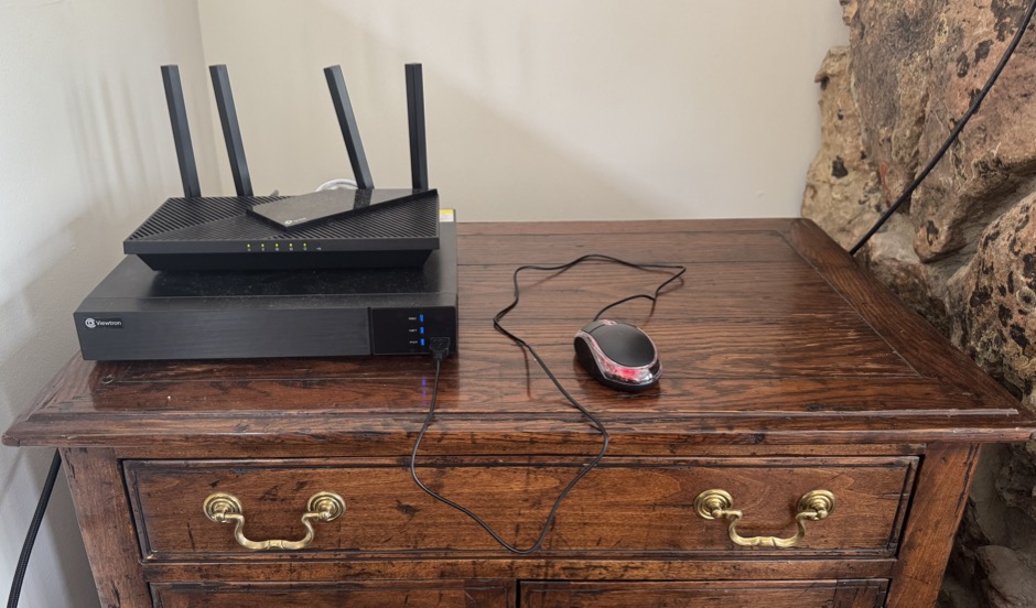security camera DVR sitting on dresser